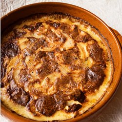 Creamy Potato Bake with Roast Garlic and Cheese